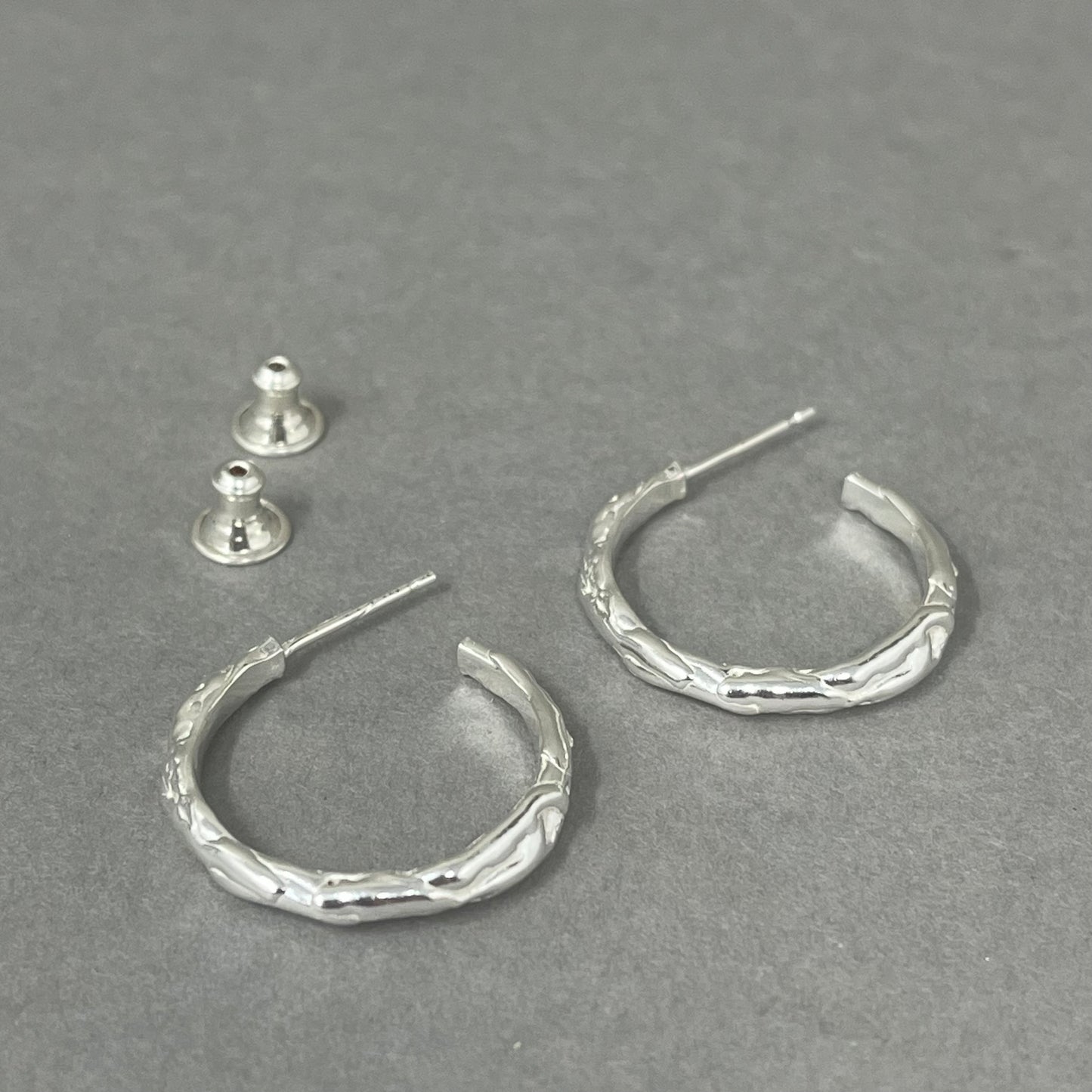 silver medium molten hoop earrings