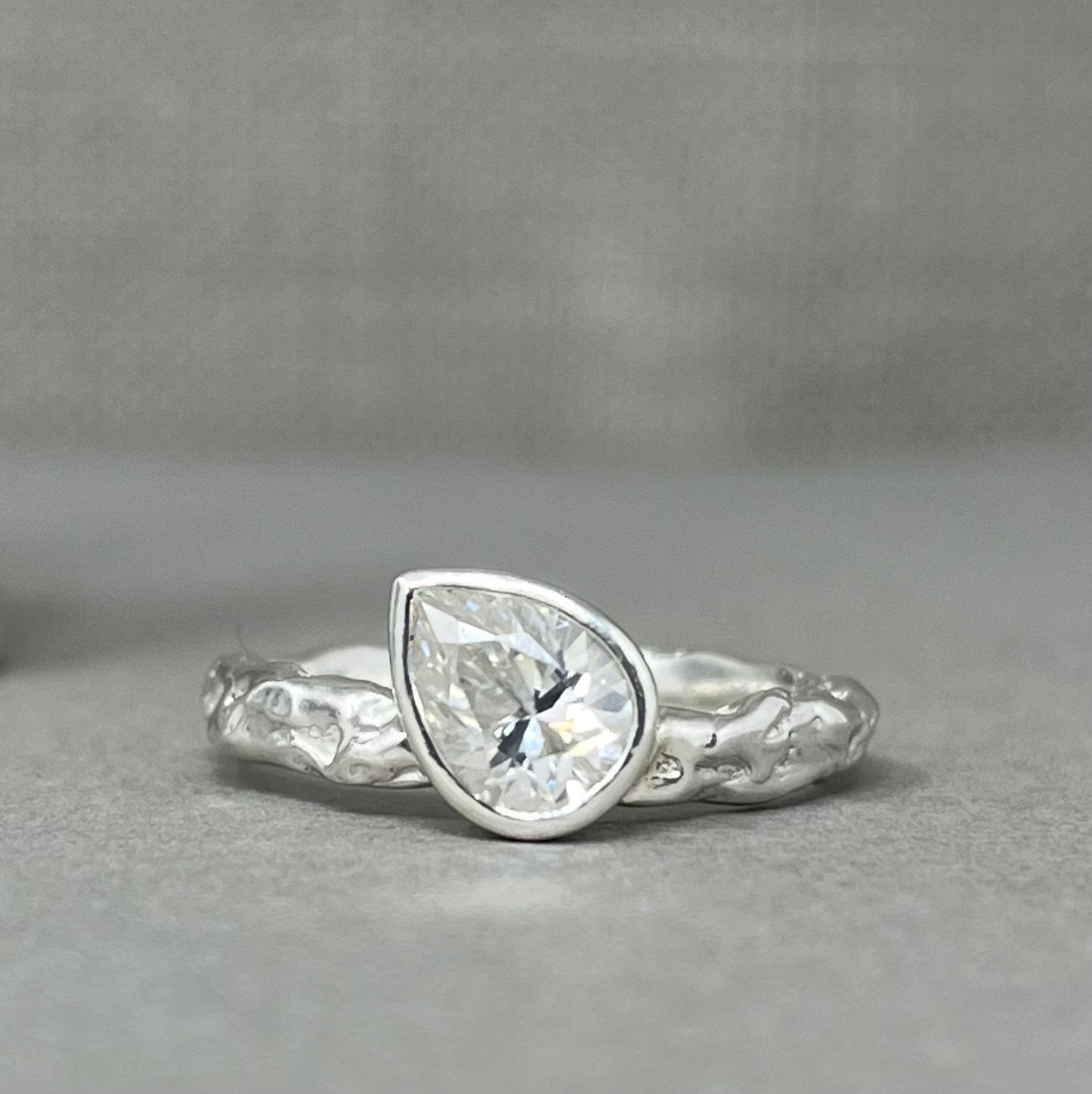 Moissanite teardrop engagement ring