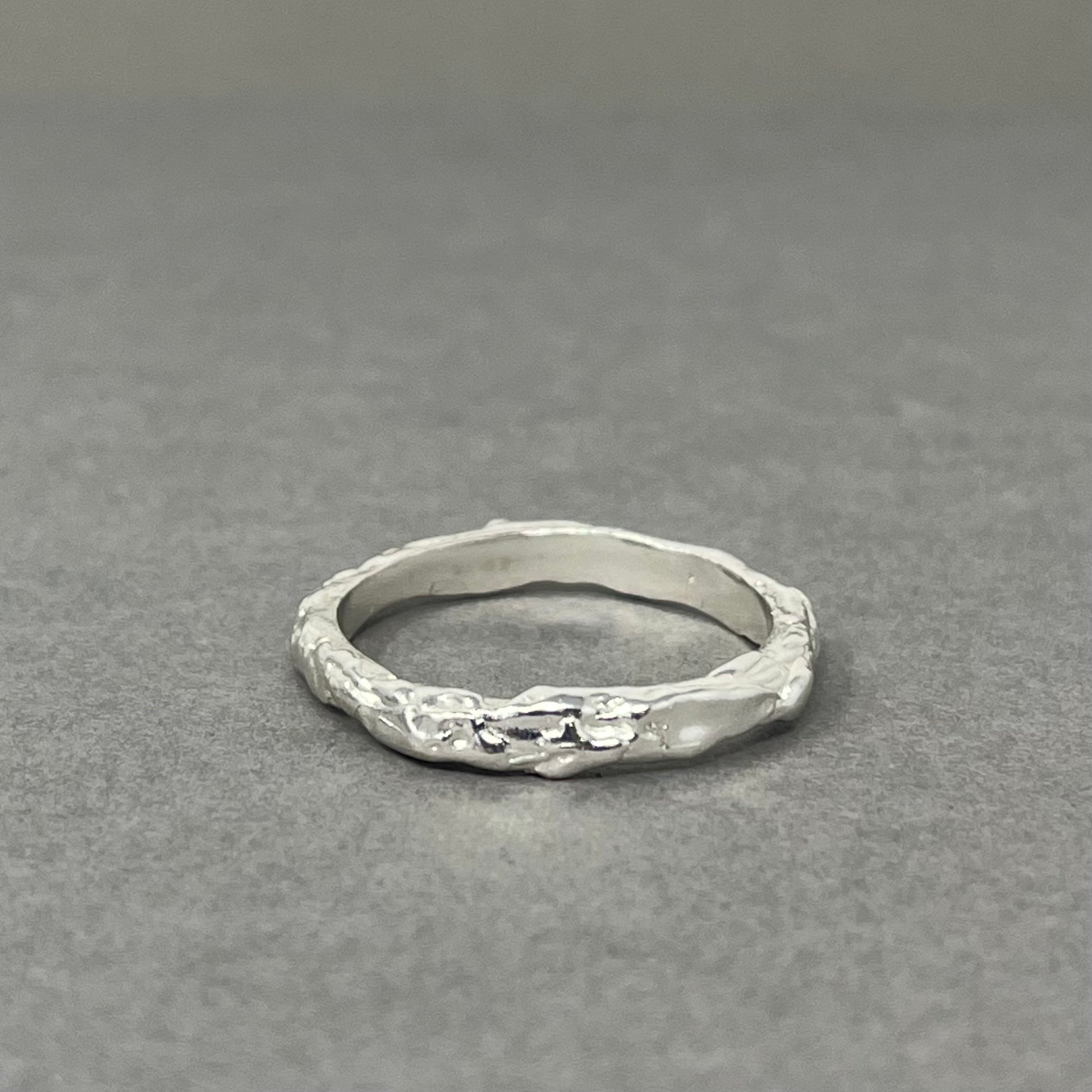Silver molten wedding ring