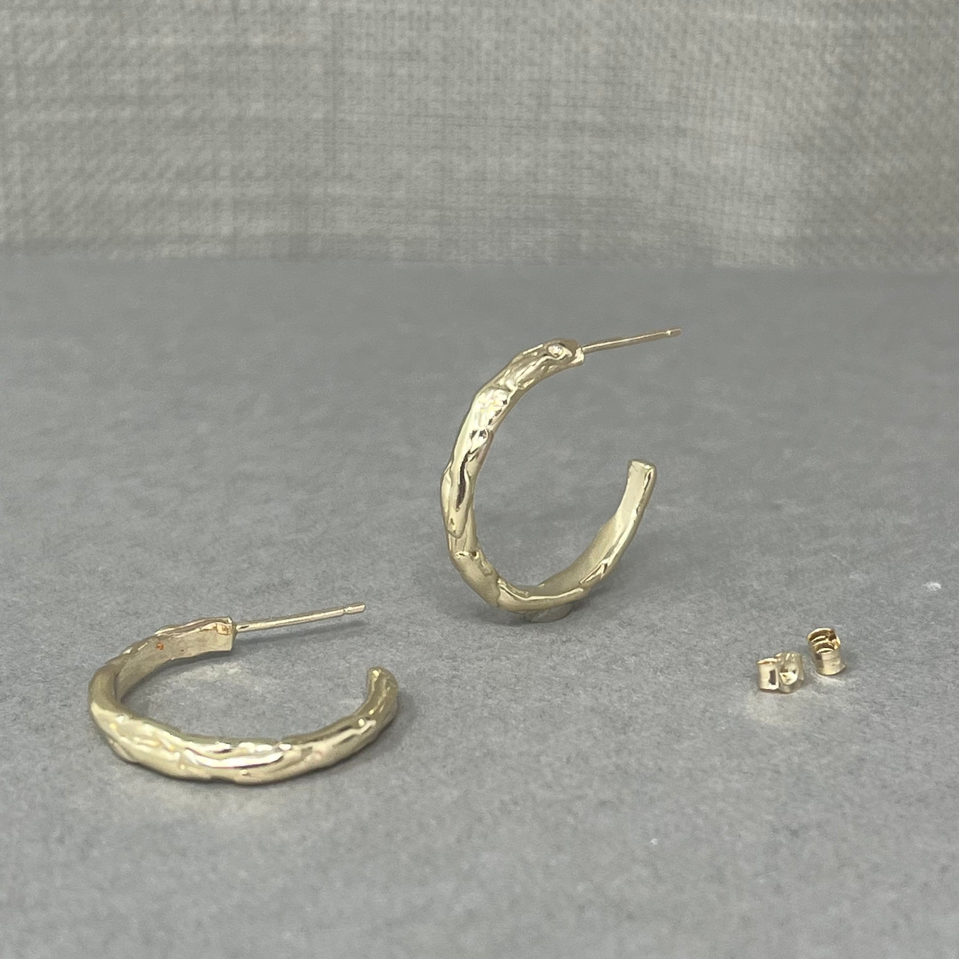 gold medium molten hoop earrings